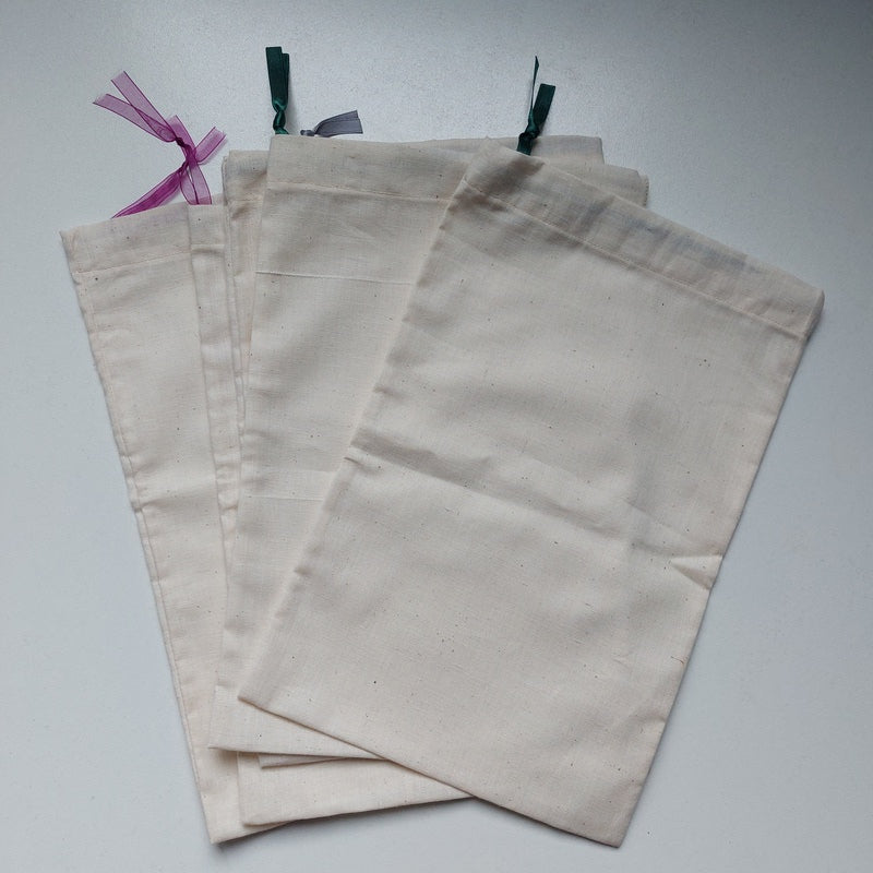 Sac à vrac en coton très résistant pour transporter et stocker les aliments achetés en vrac. Disponible en plusieurs tailles