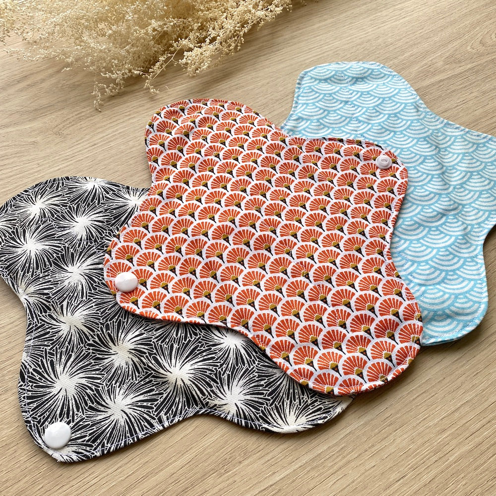 Des serviettes hygiéniques lavables pour vos règles et qui prennent soin de la planète. SHL flux moyen pour plusieurs années